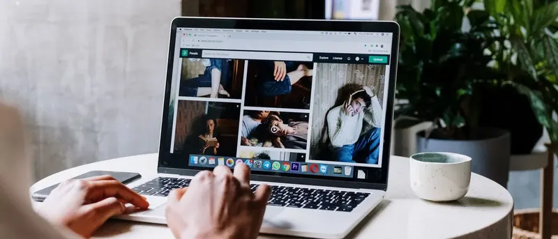 Agency account manager reviewing a white label Data Studio client report on a laptop